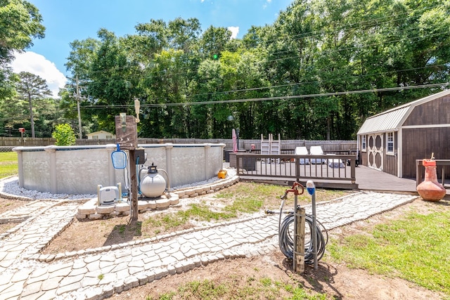 847 Phyllis Ave, Enterprise, AL 36330 - fenced backyard with a wooden deck and view of scattered trees