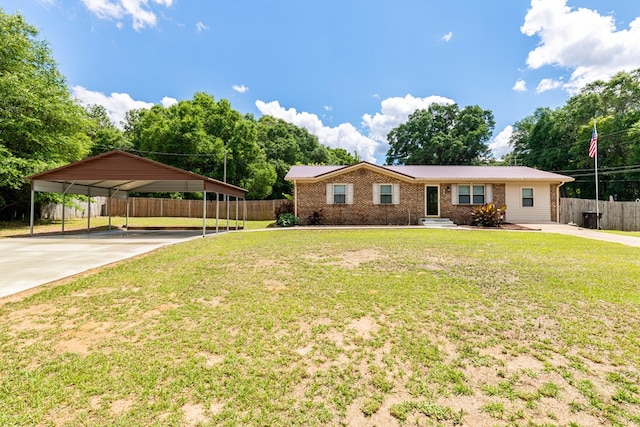 847 Phyllis Ave, Enterprise, AL 36330 - ranch-style home featuring concrete driveway, a detached carport, metal roof, and brick siding
