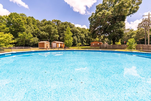 847 Phyllis Ave, Enterprise, AL 36330 - view of swimming pool featuring view of scattered trees