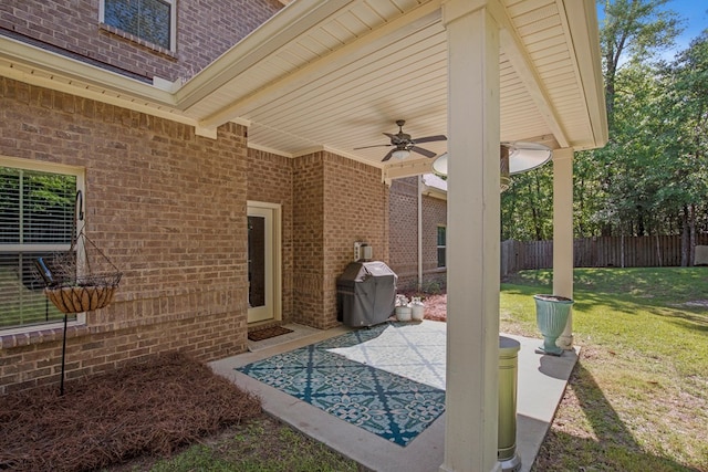 view of patio featuring grilling area and ceiling fan