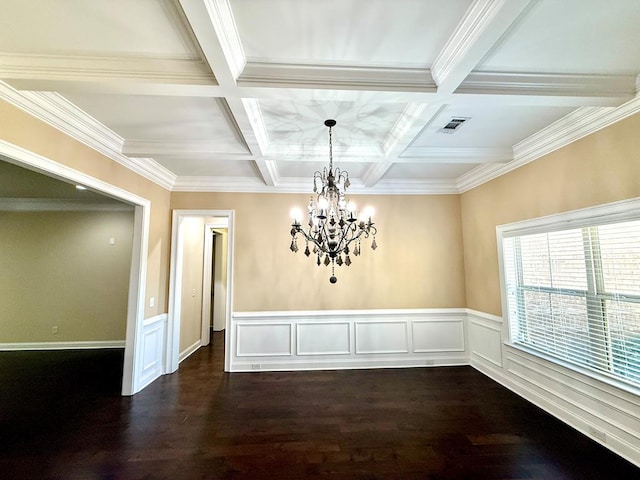 unfurnished dining area with beamed ceiling, crown molding, and coffered ceiling