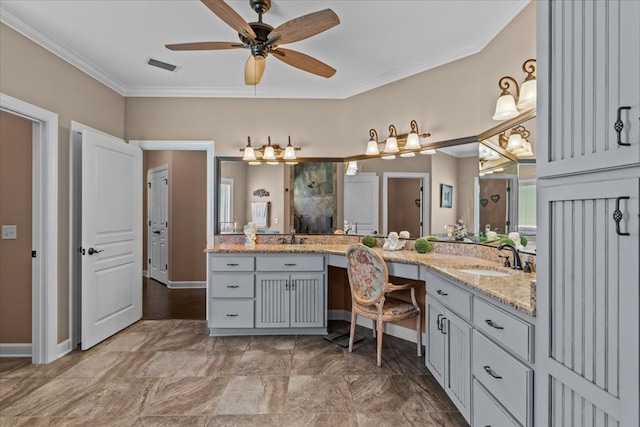 full bathroom featuring a shower, vanity, a ceiling fan, visible vents, and ornamental molding