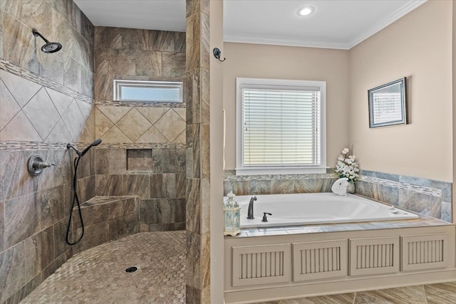 bathroom featuring crown molding, tiled shower, and a garden tub