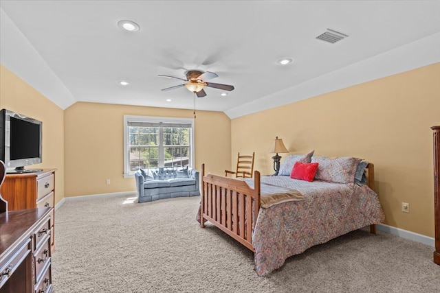 carpeted bedroom featuring vaulted ceiling, recessed lighting, baseboards, ceiling fan, and visible vents