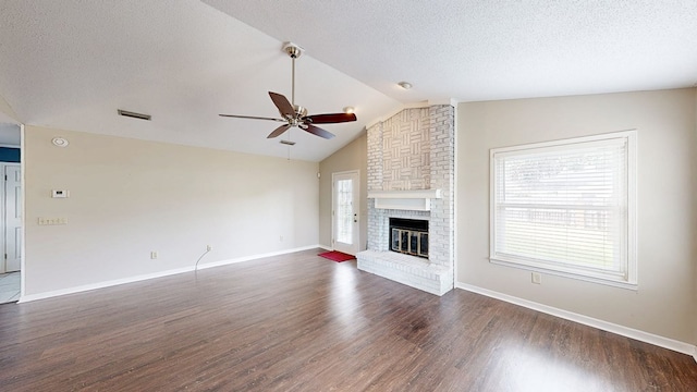 100 W Fontana Cir, Dothan, AL 36305 - unfurnished living room with ceiling fan, vaulted ceiling, a textured ceiling, and dark wood-style floors