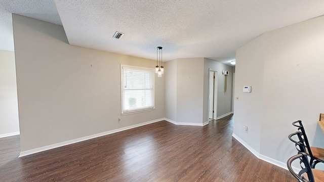 100 W Fontana Cir, Dothan, AL 36305 - empty room featuring baseboards, visible vents, a textured ceiling, and dark wood-type flooring