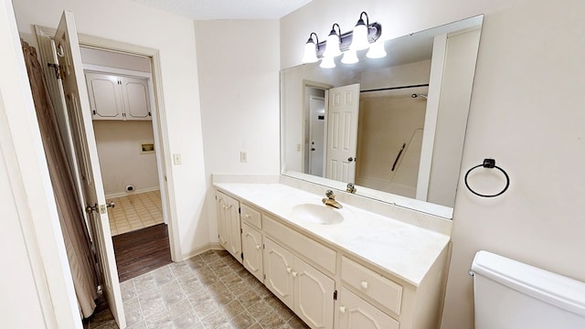 100 W Fontana Cir, Dothan, AL 36305 - bathroom with baseboards, toilet, and vanity