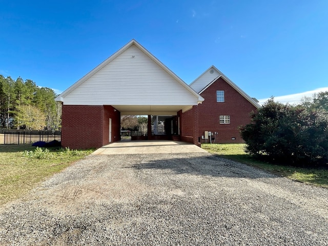 exterior space with a carport