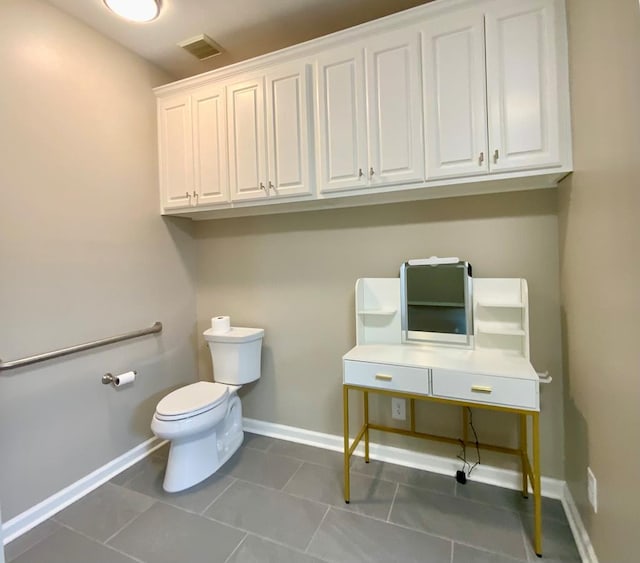 30 Cotton Creek Blvd, Enterprise, AL 36330 - bathroom featuring toilet and tile patterned flooring