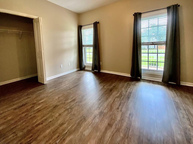 30 Cotton Creek Blvd, Enterprise, AL 36330 - unfurnished bedroom featuring dark wood-style floors and baseboards