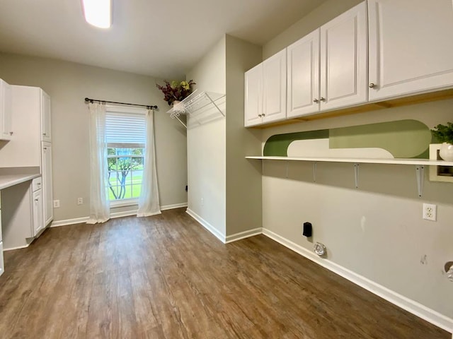 30 Cotton Creek Blvd, Enterprise, AL 36330 - laundry room featuring dark wood-style floors, gas dryer hookup, and cabinet space