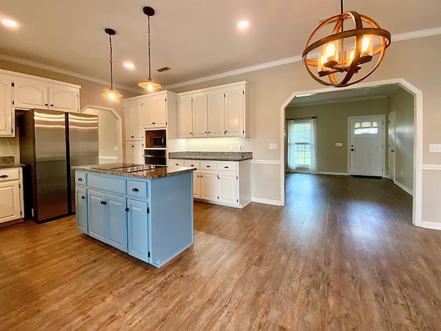 30 Cotton Creek Blvd, Enterprise, AL 36330 - kitchen featuring freestanding refrigerator, a chandelier, white cabinets, ornamental molding, and recessed lighting