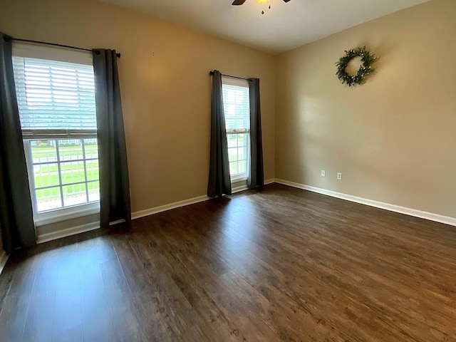 30 Cotton Creek Blvd, Enterprise, AL 36330 - unfurnished room with dark wood-type flooring, a ceiling fan, and plenty of natural light