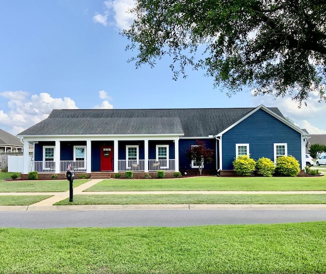 30 Cotton Creek Blvd, Enterprise, AL 36330 - view of front facade featuring covered porch and a front lawn