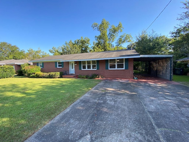 ranch-style house with a carport and a front lawn