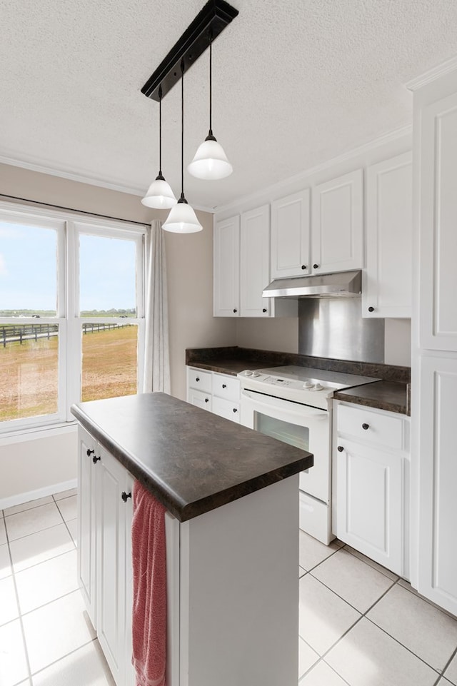 kitchen with white cabinets, white electric range, a kitchen island, and pendant lighting