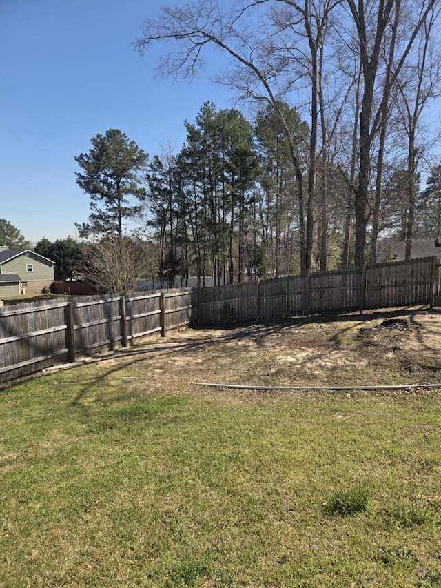 view of yard featuring a fenced backyard