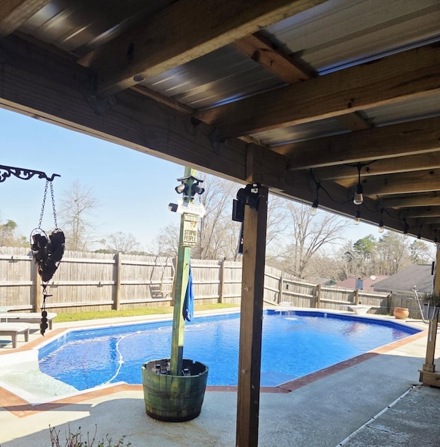 view of pool with a fenced in pool, a patio, and a fenced backyard