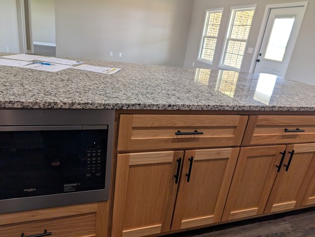 12589 Fortner St, Newton, AL 36352 - kitchen featuring built in microwave and light stone countertops