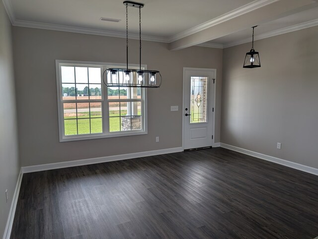 12589 Fortner St, Newton, AL 36352 - unfurnished dining area featuring plenty of natural light, dark wood-style floors, ornamental molding, and baseboards