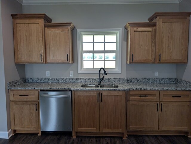 12589 Fortner St, Newton, AL 36352 - kitchen with stainless steel dishwasher, a sink, dark wood-type flooring, light stone counters, and ornamental molding