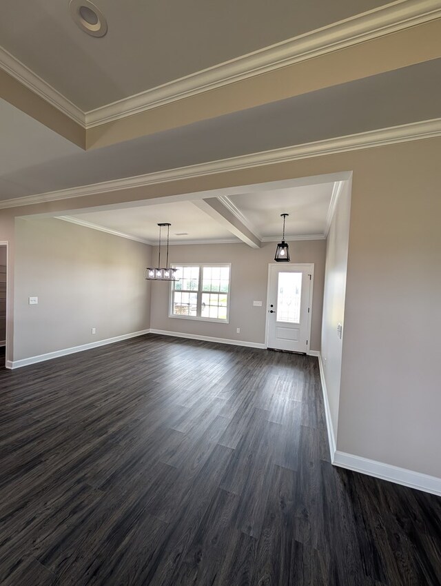 12589 Fortner St, Newton, AL 36352 - unfurnished living room featuring dark wood-style floors, baseboards, and crown molding