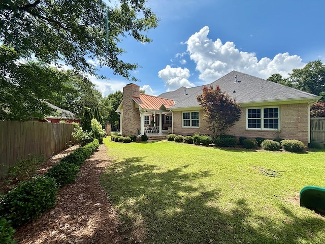 403 Stonegate Dr, Dothan, AL 36305 - rear view of property with a chimney, brick siding, and a shingled roof