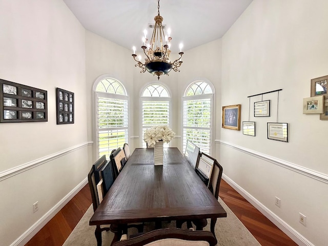 403 Stonegate Dr, Dothan, AL 36305 - dining area with a chandelier, plenty of natural light, wood finished floors, and a high ceiling