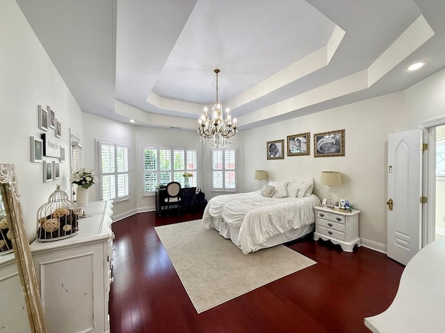 403 Stonegate Dr, Dothan, AL 36305 - bedroom featuring a chandelier, a raised ceiling, dark wood finished floors, and recessed lighting