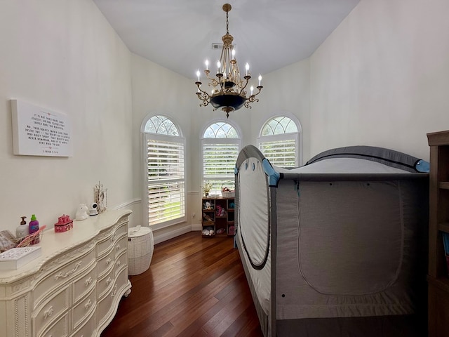 403 Stonegate Dr, Dothan, AL 36305 - laundry area featuring a chandelier and dark wood-style flooring