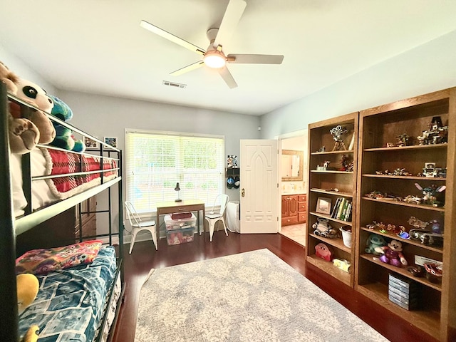 403 Stonegate Dr, Dothan, AL 36305 - bedroom with dark wood finished floors, ensuite bath, and a ceiling fan
