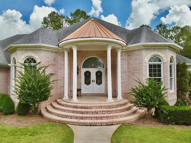 403 Stonegate Dr, Dothan, AL 36305 - view of exterior entry featuring brick siding and a shingled roof