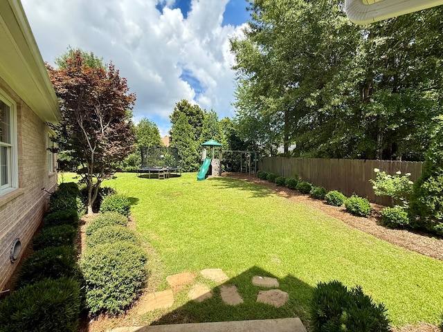 403 Stonegate Dr, Dothan, AL 36305 - view of yard featuring a trampoline and a playground