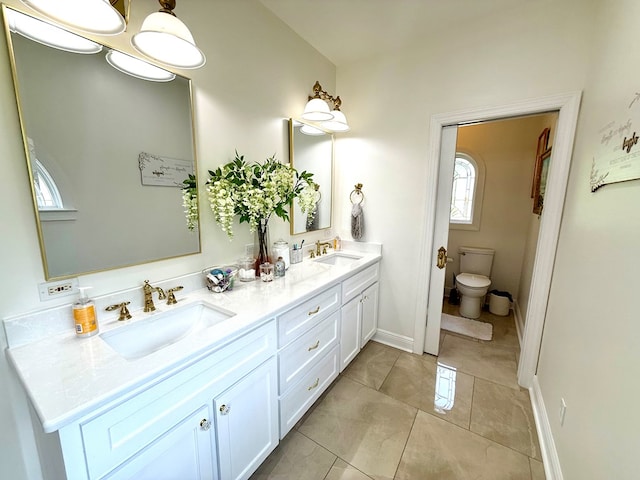 403 Stonegate Dr, Dothan, AL 36305 - bathroom with double vanity and toilet