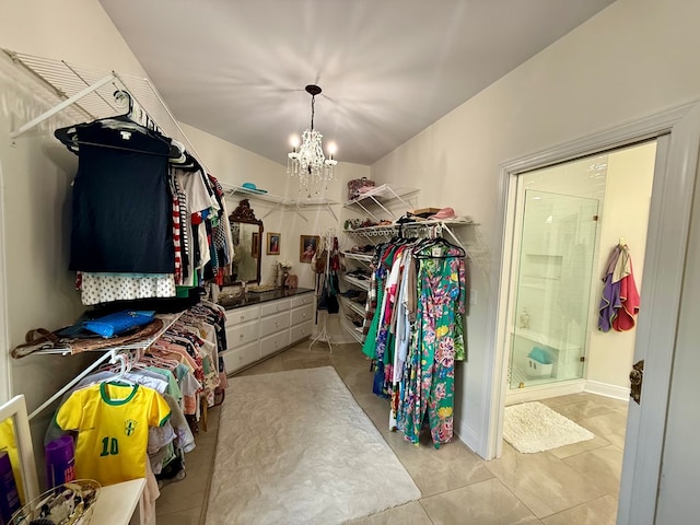 403 Stonegate Dr, Dothan, AL 36305 - spacious closet with a chandelier and tile patterned floors