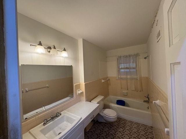 bathroom with tub / shower combination, visible vents, toilet, and tile walls