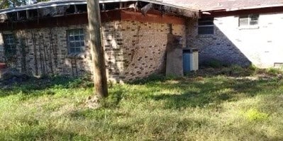 view of home's exterior featuring a lawn