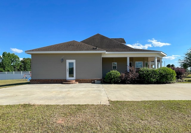 1621 Adkinson Rd, Newton, AL 36352 - back of house featuring a shingled roof, entry steps, and a patio area