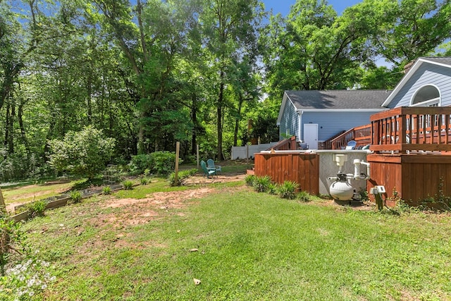 102 Lindsey Ln, Dothan, AL 36305 - view of green lawn featuring a deck