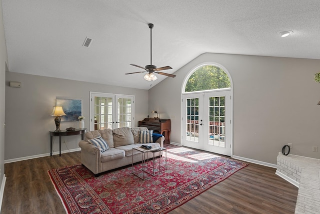 102 Lindsey Ln, Dothan, AL 36305 - living area featuring french doors, vaulted ceiling, wood finished floors, ceiling fan, and a textured ceiling