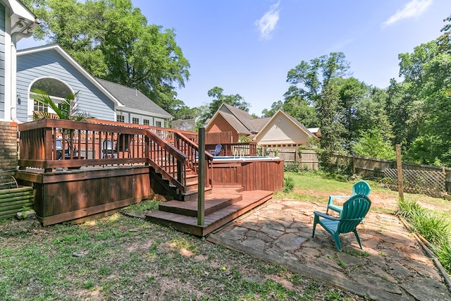 102 Lindsey Ln, Dothan, AL 36305 - fenced backyard featuring a patio, a wooden deck, and a hot tub