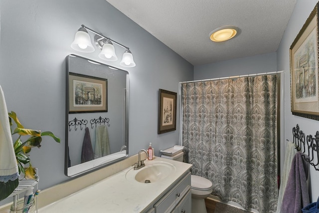 102 Lindsey Ln, Dothan, AL 36305 - full bathroom with toilet, vanity, a textured ceiling, a shower with curtain, and wood finished floors