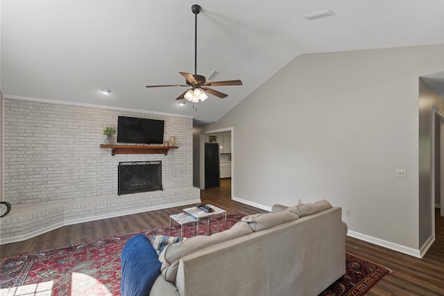 102 Lindsey Ln, Dothan, AL 36305 - living room with wood finished floors, a ceiling fan, lofted ceiling, a fireplace, and baseboards