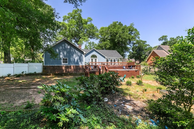 102 Lindsey Ln, Dothan, AL 36305 - back of house featuring a deck and brick siding