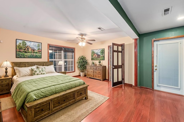 bedroom featuring hardwood / wood-style flooring and ceiling fan