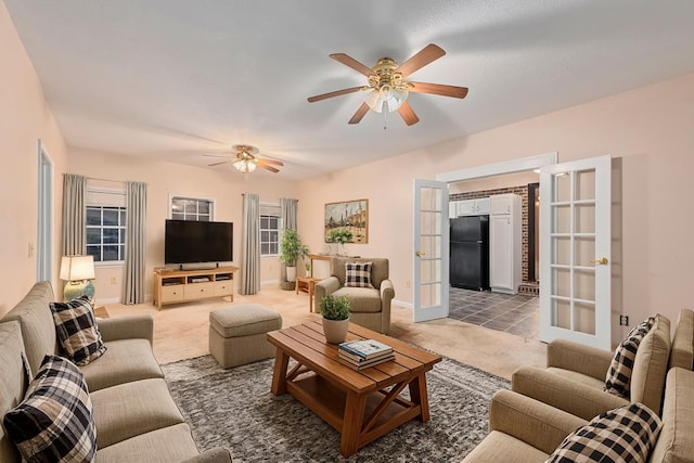 living room featuring carpet flooring and french doors