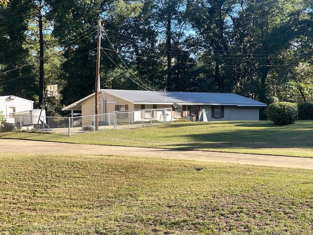 view of front facade with a front lawn