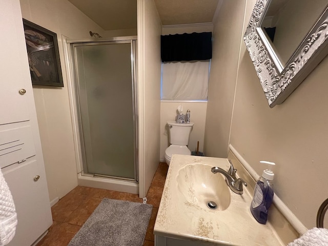 bathroom featuring tile patterned floors, sink, an enclosed shower, and toilet