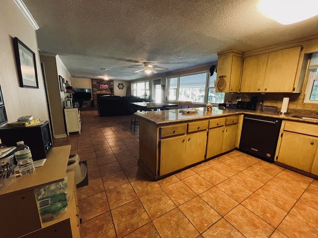 kitchen featuring dishwasher, ceiling fan, kitchen peninsula, and light tile patterned floors