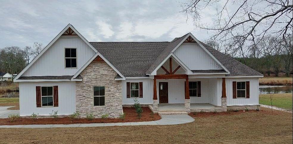 861 Clayton Rd, Ashford, AL 36312 - modern farmhouse with a porch and stone siding